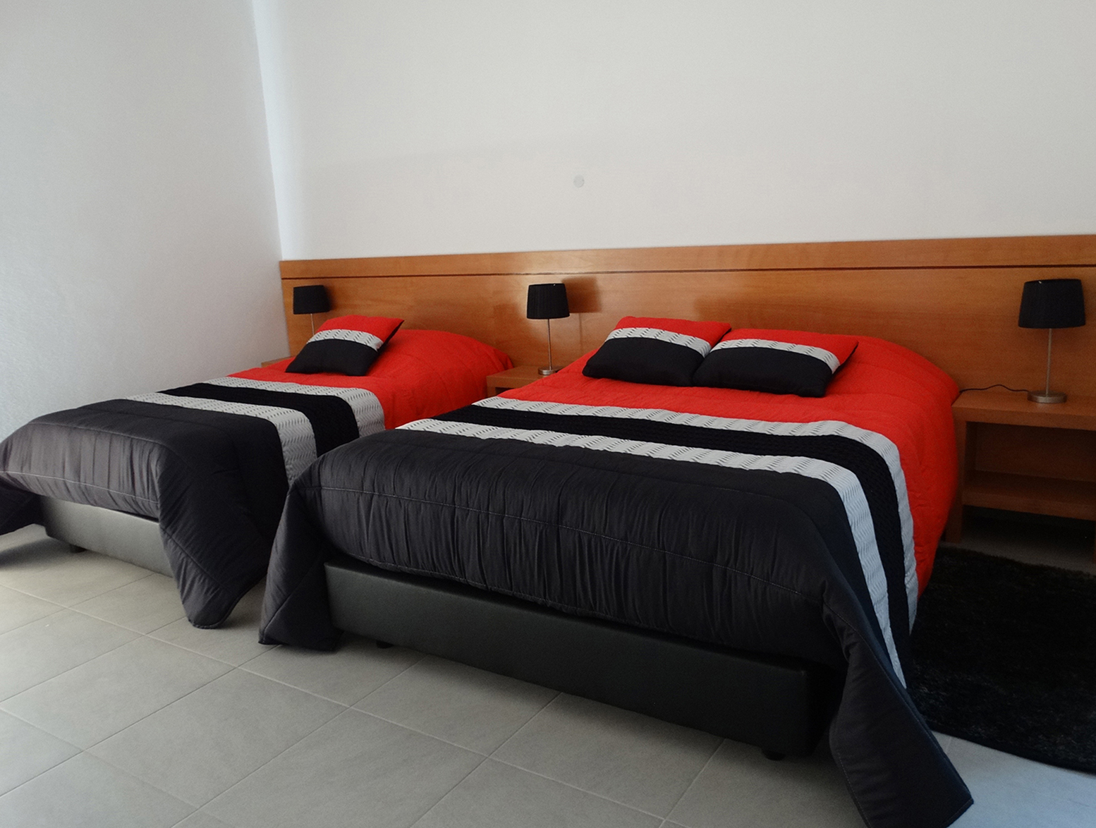 Quartos de Casal com Cama Extra